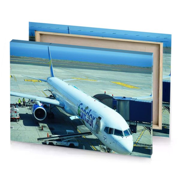 a plane is parked on the tarmac light steel blue canvas - Image 4