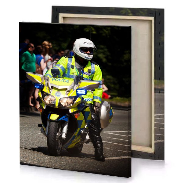 a police officer riding motorcycle down street khaki canvas - Image 4