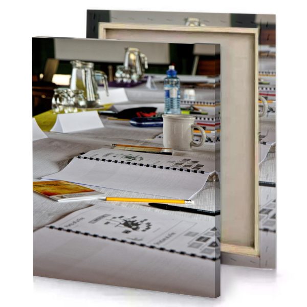 a table with bunch of papers and cup coffee silver canvas - Image 4