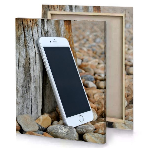 a white cell phone sitting on rock bistre canvas - Image 4