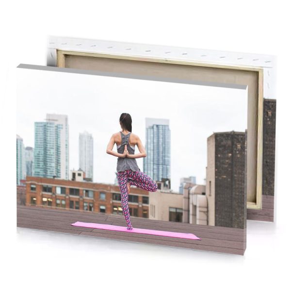 a woman doing yoga on rooftop silver canvas - Image 4