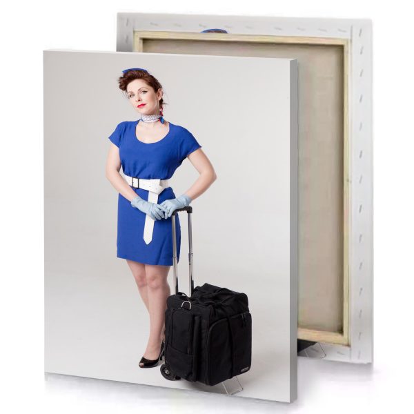 a woman in blue dress and gloves with suitcase gainsboro canvas - Image 4