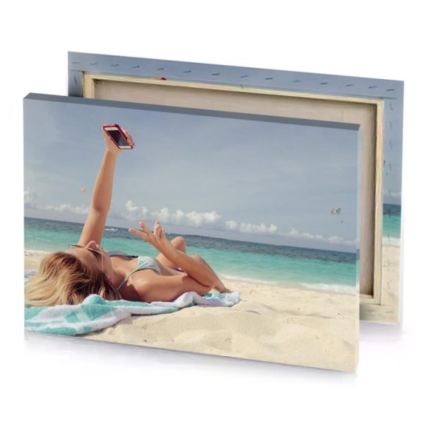 a woman laying on the beach bittersweet shimmer canvas - Image 4
