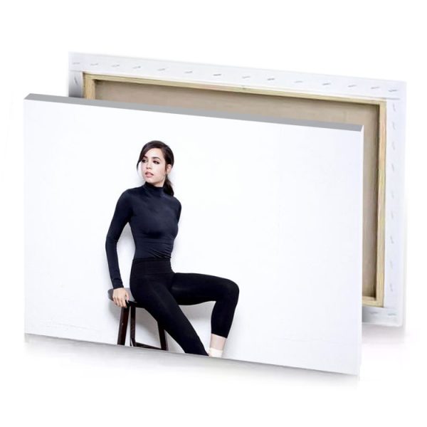 a woman sitting on stool wearing black top and leggings smoky canvas - Image 4