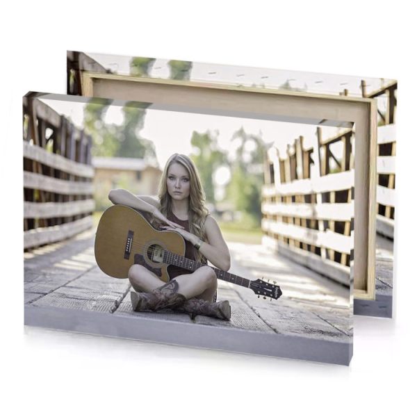a woman sitting on the ground with guitar dark olive green canvas - Image 4