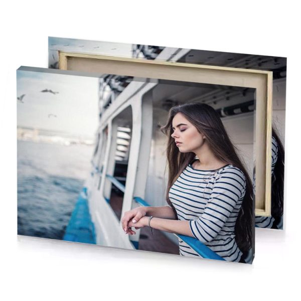 a woman standing on boat looking out at the water silver canvas - Image 4