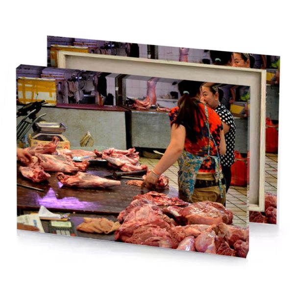 a woman standing over table with meat rosy brown canvas - Image 4