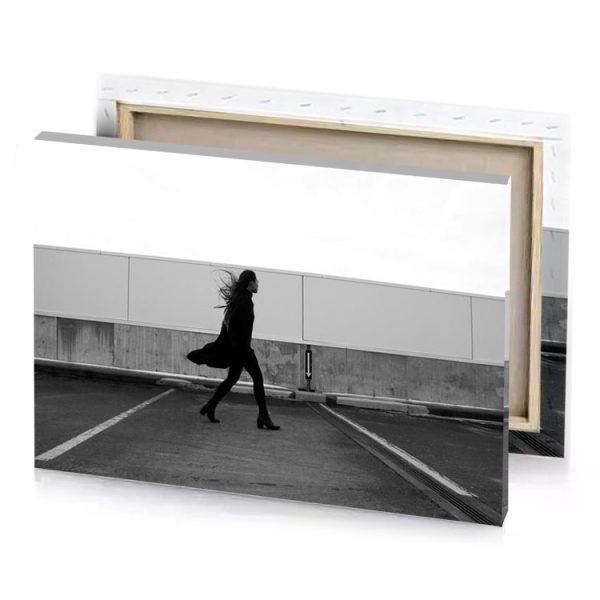 a woman walking down street with skateboard black canvas - Image 4