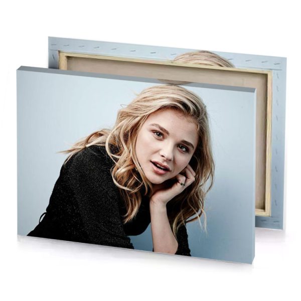 a woman with blonde hair and black top light steel blue canvas - Image 4