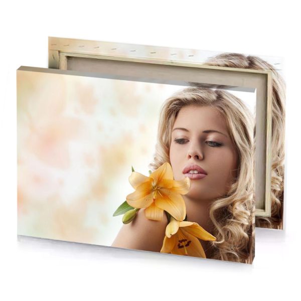 a woman with long blonde hair and flower in her linen canvas - Image 4