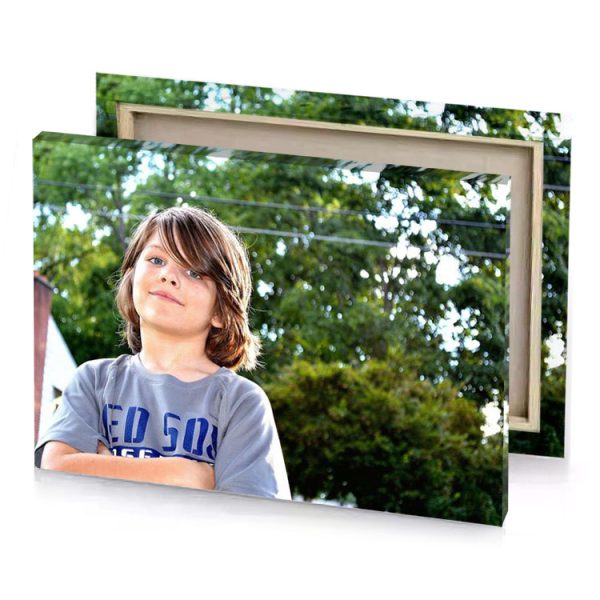 a young boy standing in front of building hunter green canvas - Image 4
