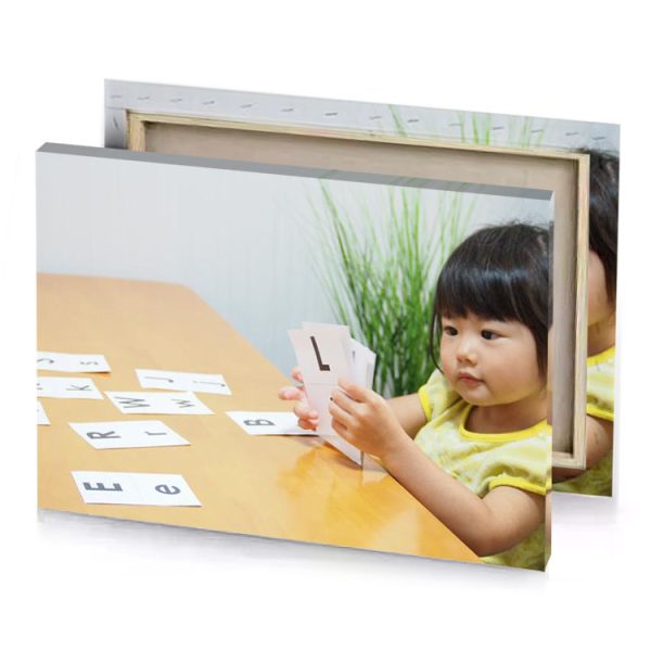 a young girl sitting at table platinum canvas - Image 4