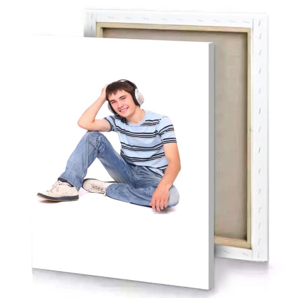 a young man sitting on the floor with his headphones white canvas - Image 4