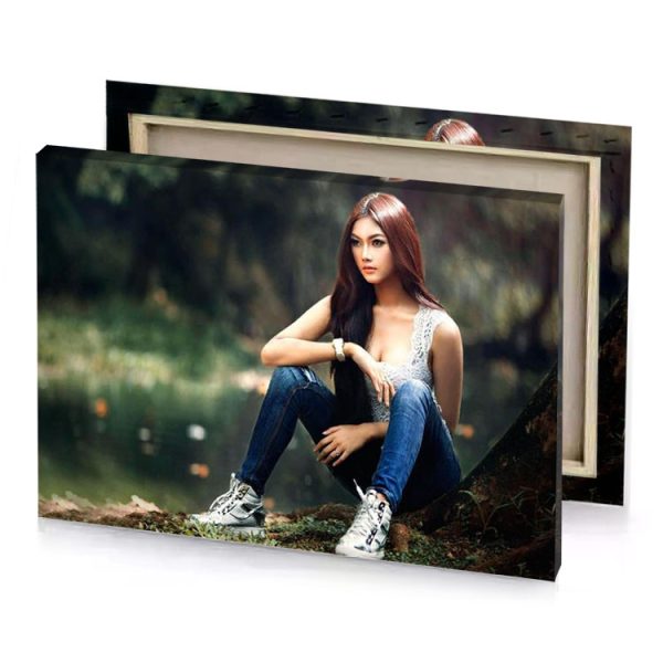 beautiful girl in jeans sitting on the ground smoky black canvas - Image 4