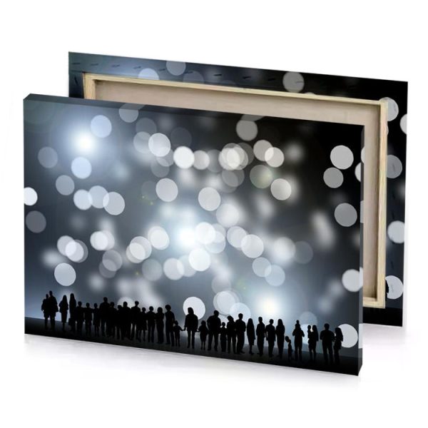 silhouettes of people standing in front a bright light silver canvas - Image 4