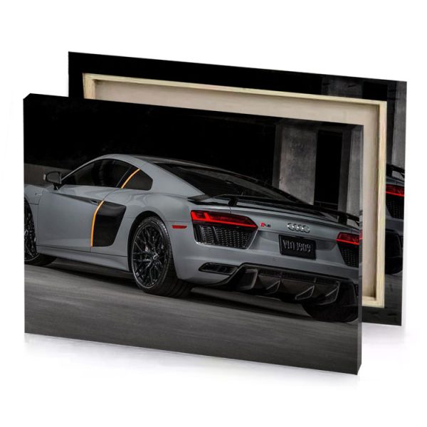 the audi sports car is shown in a dark room gray canvas - Image 4
