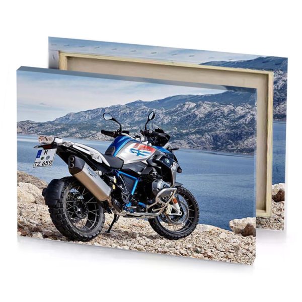 the bmw motorcycle parked on rocks near water smoky black canvas - Image 4