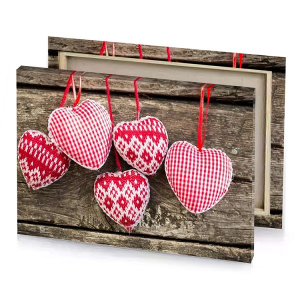 three red and white hearts hanging on a wooden background light pink canvas - Image 4