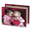 two babies are laying on a red blanket camouflage green canvas - Image 4