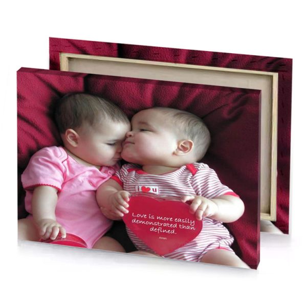 two babies are laying on a red blanket camouflage green canvas - Image 4
