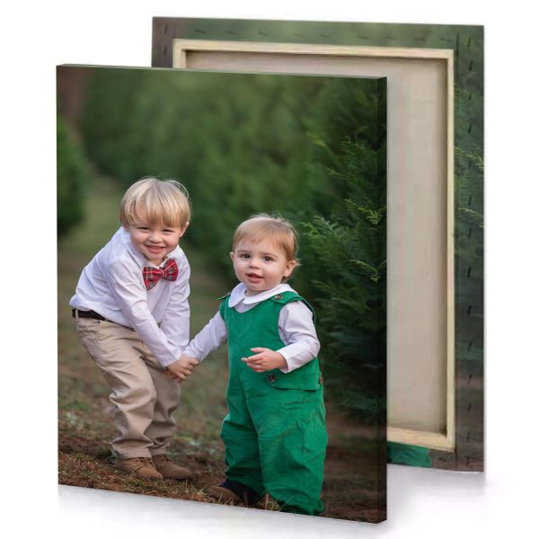 two boys in green overalls and bow ties playing the hunter canvas - Image 4