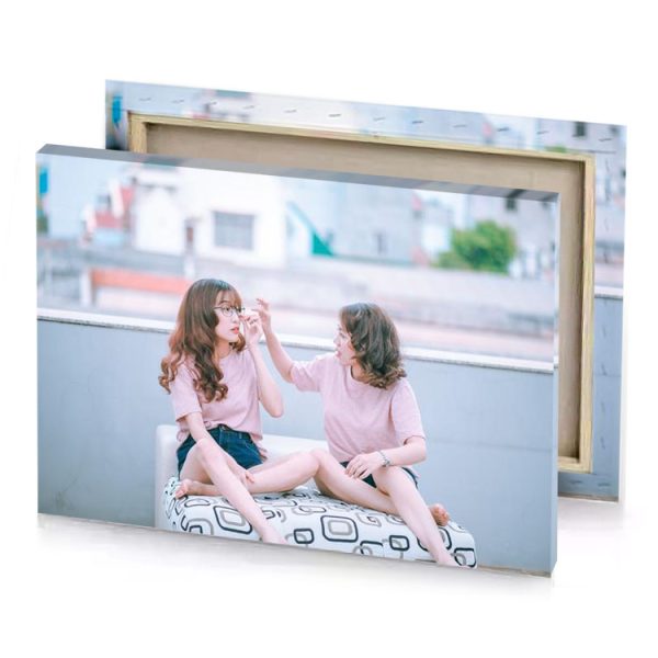 two girls sitting on a couch light steel blue canvas - Image 4