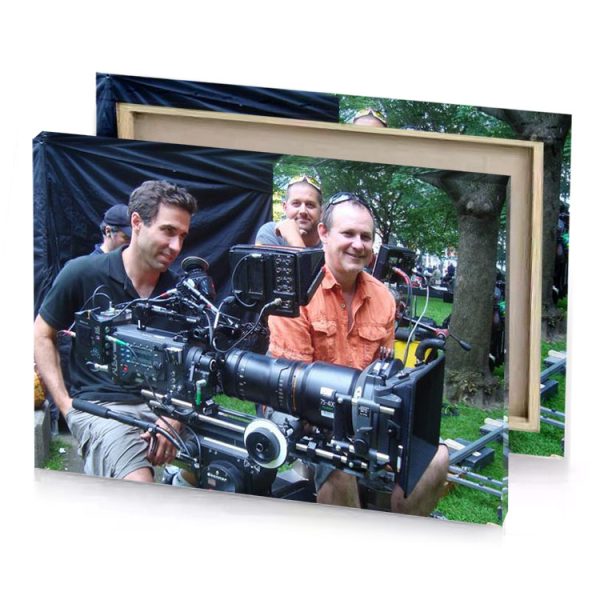 two men are sitting on a bench with camera charcoal canvas - Image 4