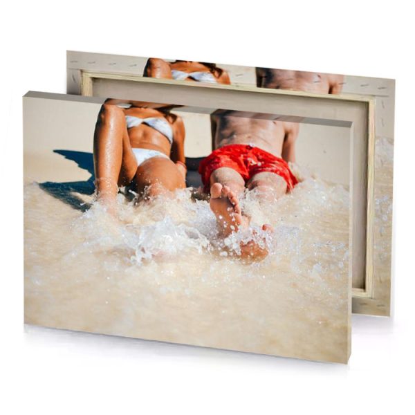 two people laying in the water on a beach gainsboro canvas - Image 4