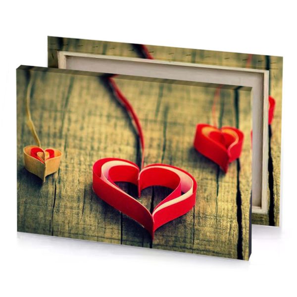 two red hearts on a wooden table spanish canvas - Image 4