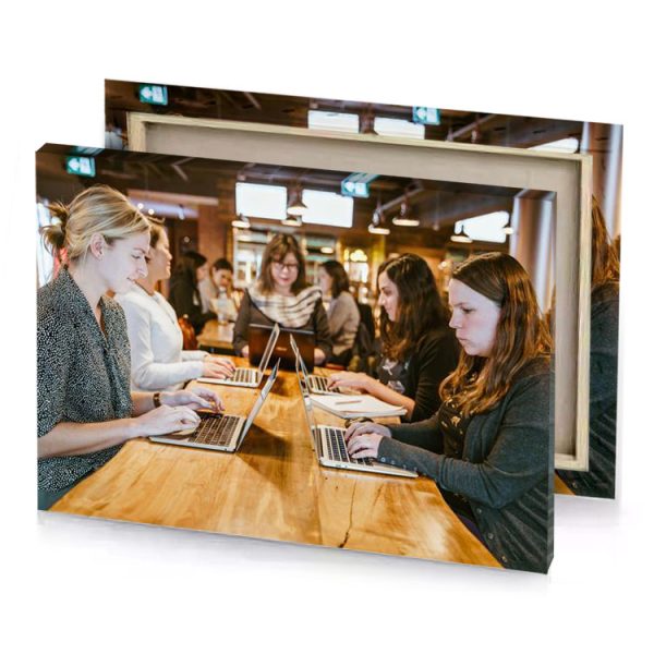 two women sitting at a table with laptops bistre canvas - Image 4