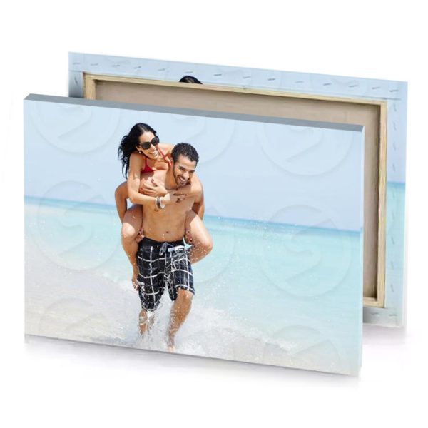 young couple having fun on the beach photo lavender canvas - Image 4