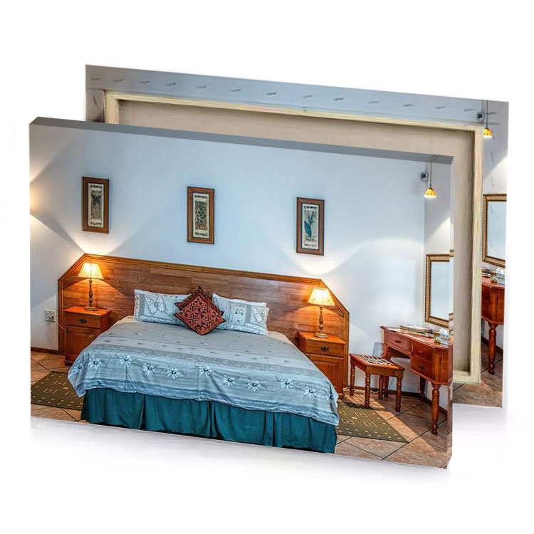 a bed with blue blanket light steel canvas