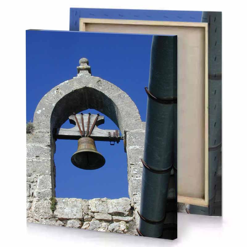 a bell is hanging from stone wall steel blue canvas