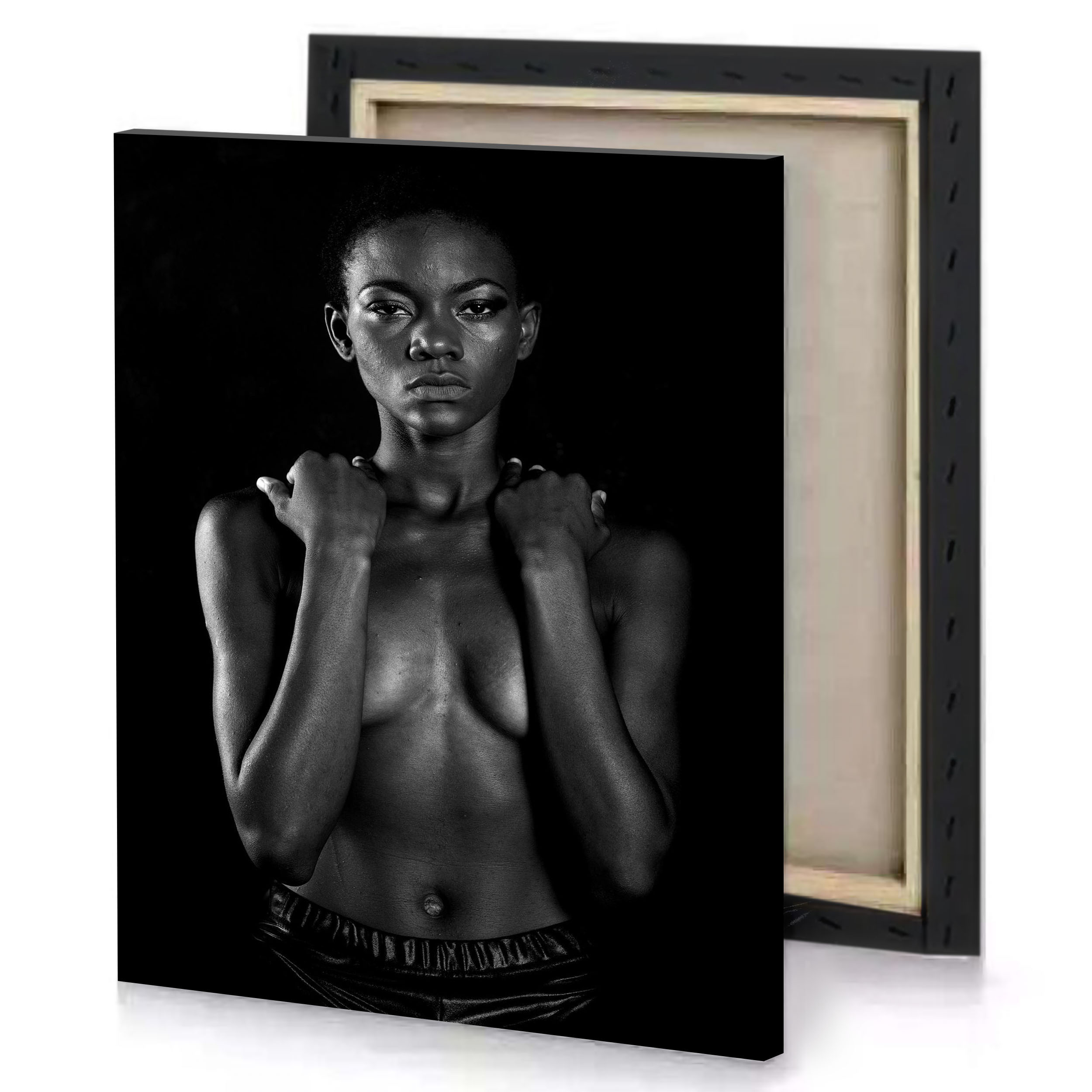 a black and white photo of woman with no shirt canvas