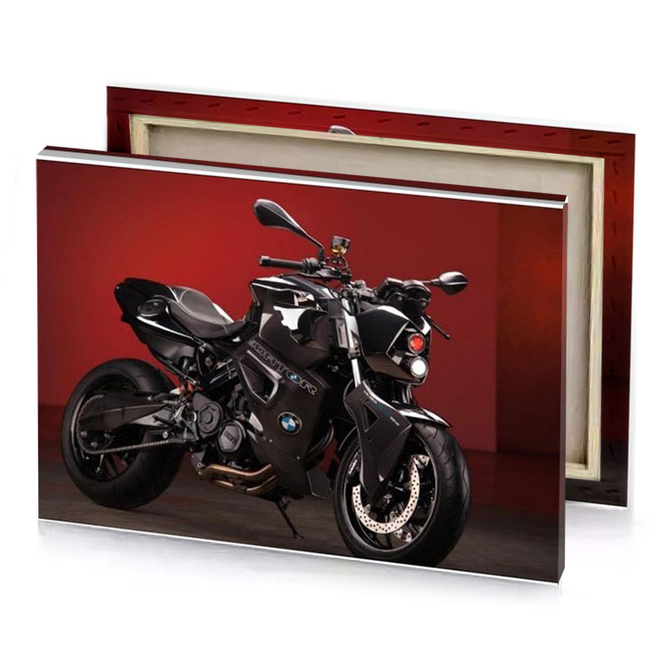 a black motorcycle parked in red room garnet canvas