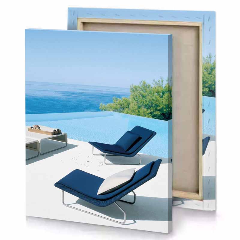 a blue and white lounge chair next to pool maximum canvas