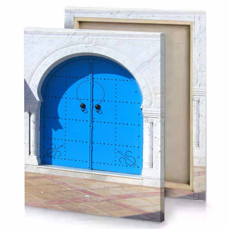 a blue door with white wall and red brick floor dodger canvas