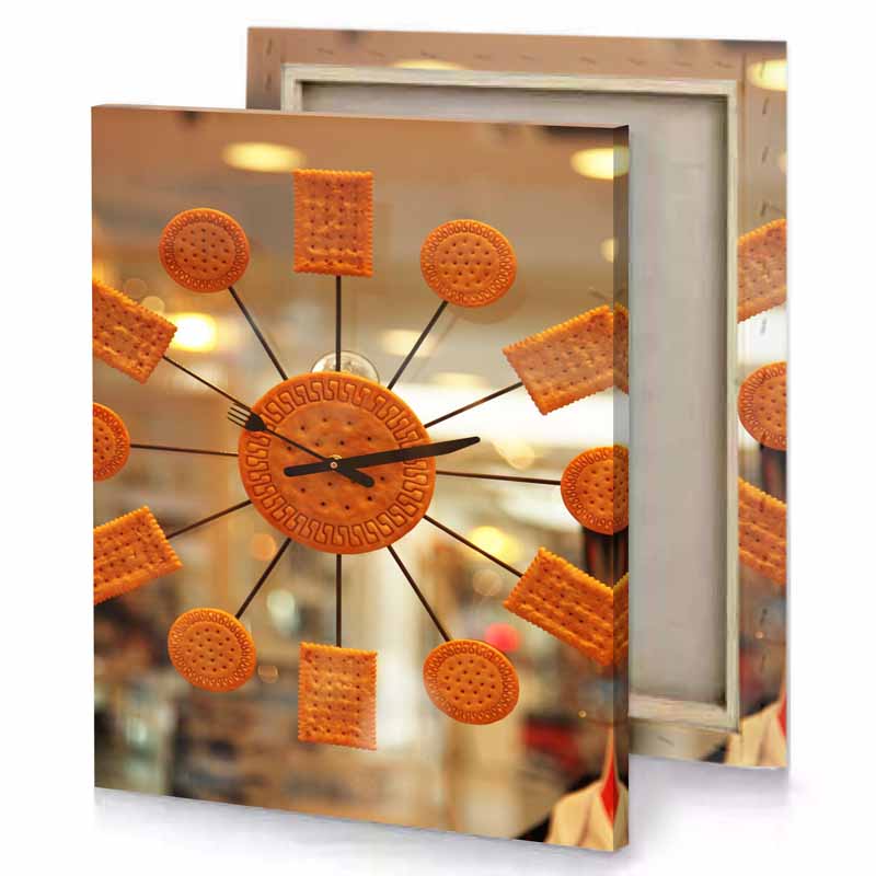 a clock made of biscuits and cracks chocolate canvas