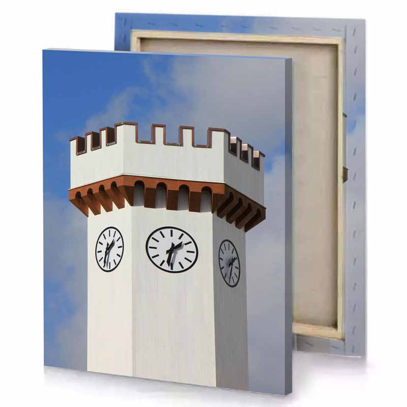 a clock tower with on top garnet canvas
