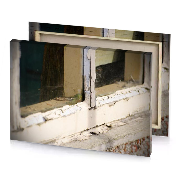 a close up of window with broken pane linen canvas