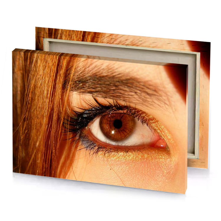 a close up of woman s eye maroon canvas