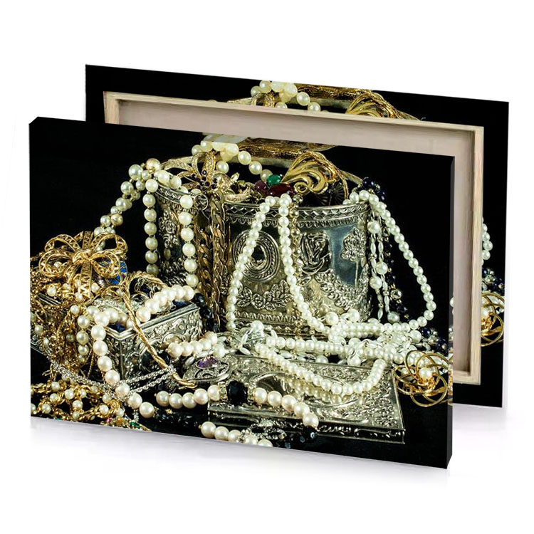 a collection of jewelry including silver box and camouflage green canvas