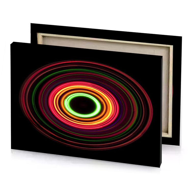 a colorful light painting on black background crimson canvas