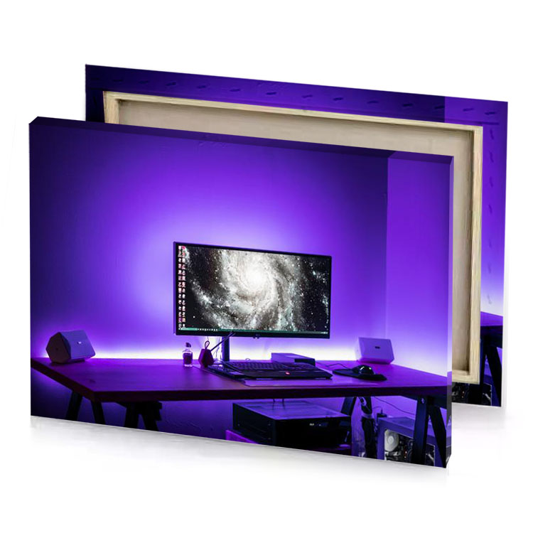 a computer on desk with purple light blue violet canvas