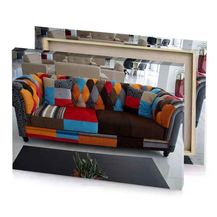 a couch with colorful pillows on it dark red canvas