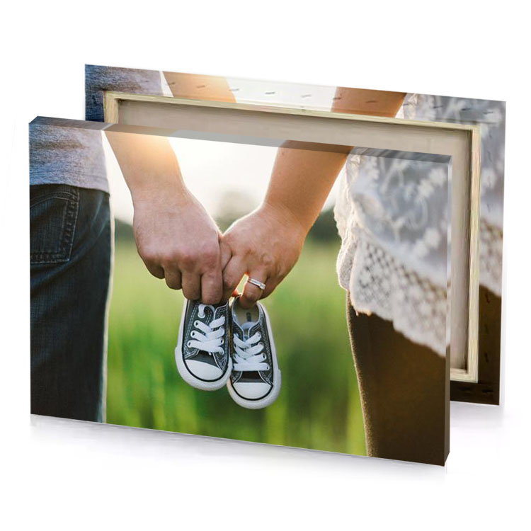a couple holding hands while walking through field sage canvas