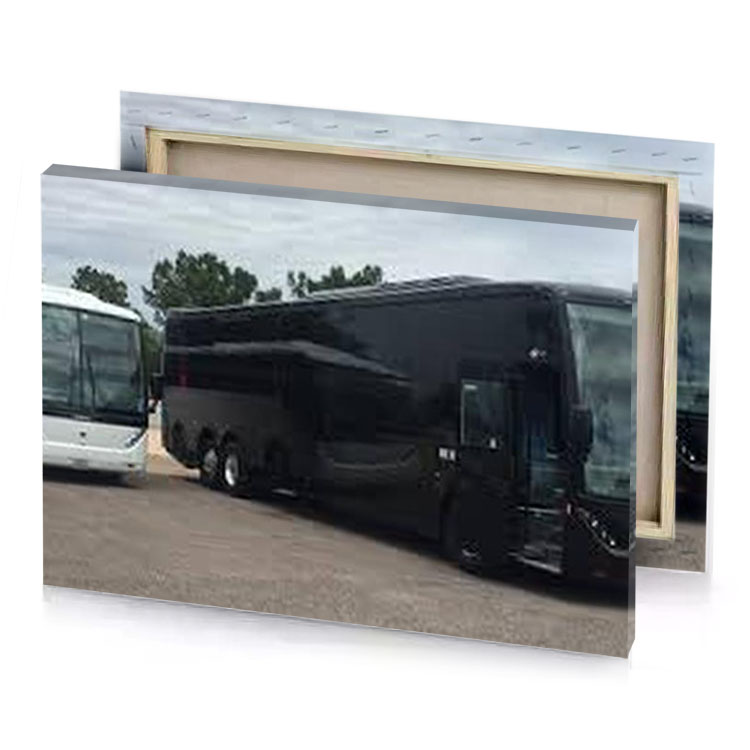 a couple of buses parked in parking smoky black canvas