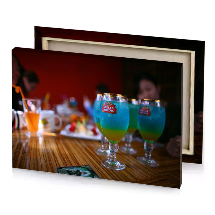 a couple of glasses sitting on table denim blue canvas