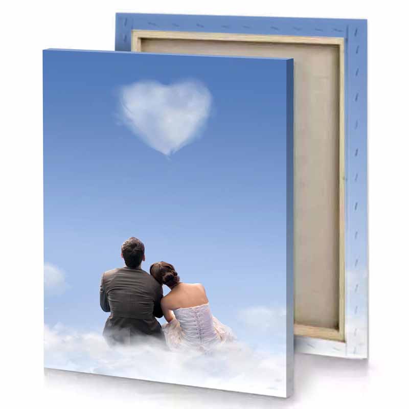 a couple sitting on top of cloud iceberg canvas