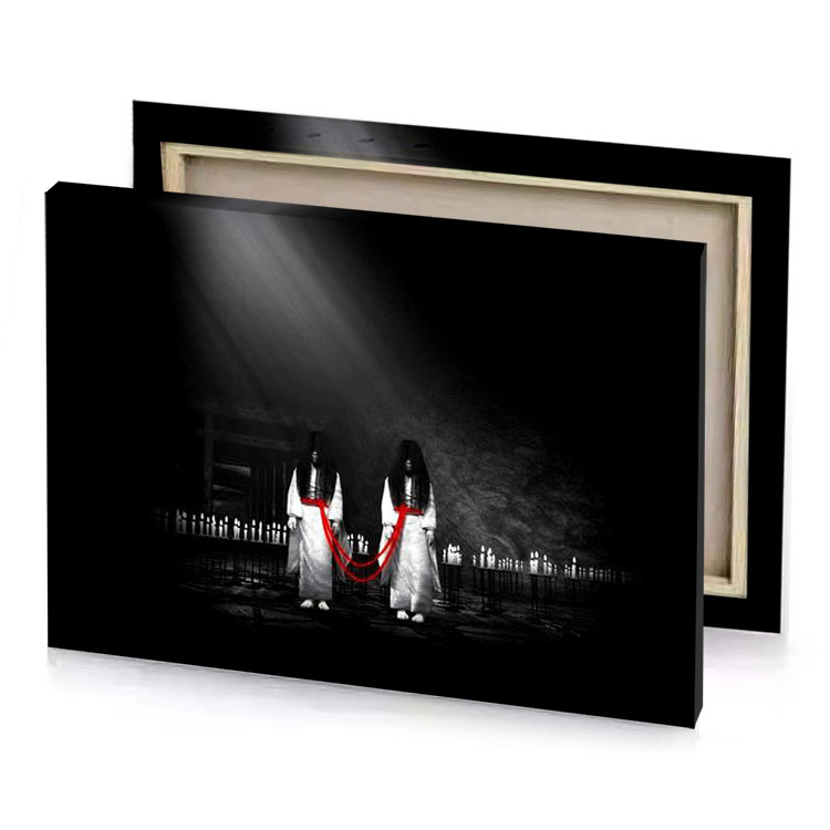 a couple standing in front of fence smoky black canvas